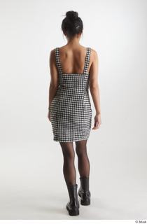 Wild Nicol 1 back view black boots checkered short dress…